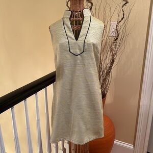 Sail to Sable green dress with silver white and black trim around neck